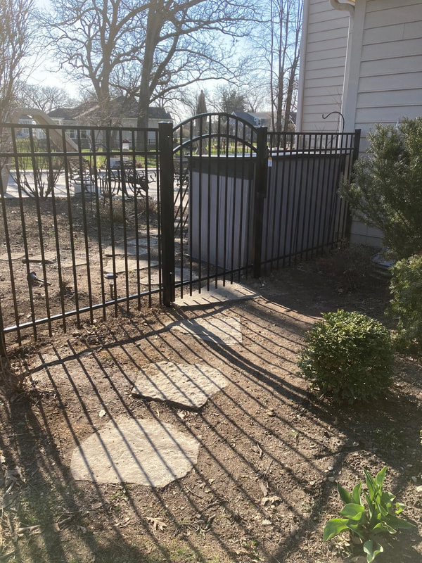 black aluminum fence installation