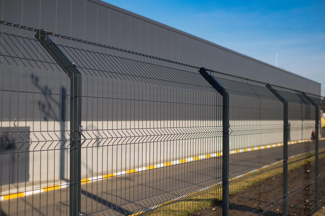 security commercial fencing fence contractor warehouse factory installation